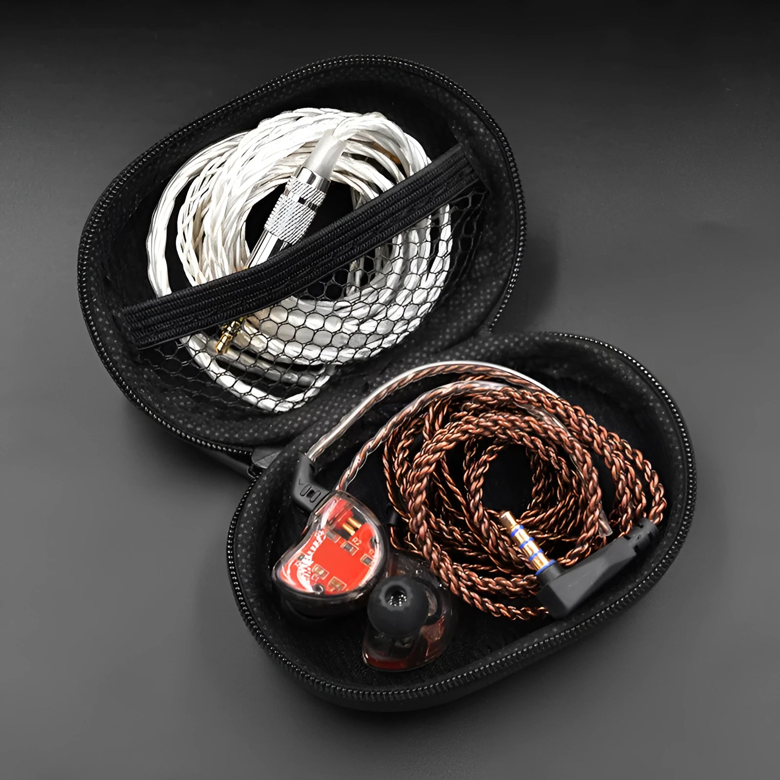 Black oval leather storage bag for earphones compatible with EDX PRO and other models
