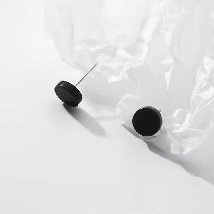 Sterling silver S999 flat ear bone studs in geometric round design, silver and black colour options