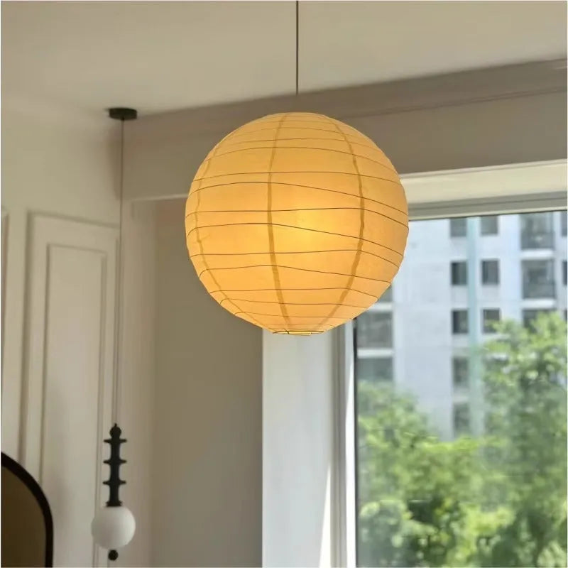 Japanese-style rice paper ball pendant chandelier in living room setting