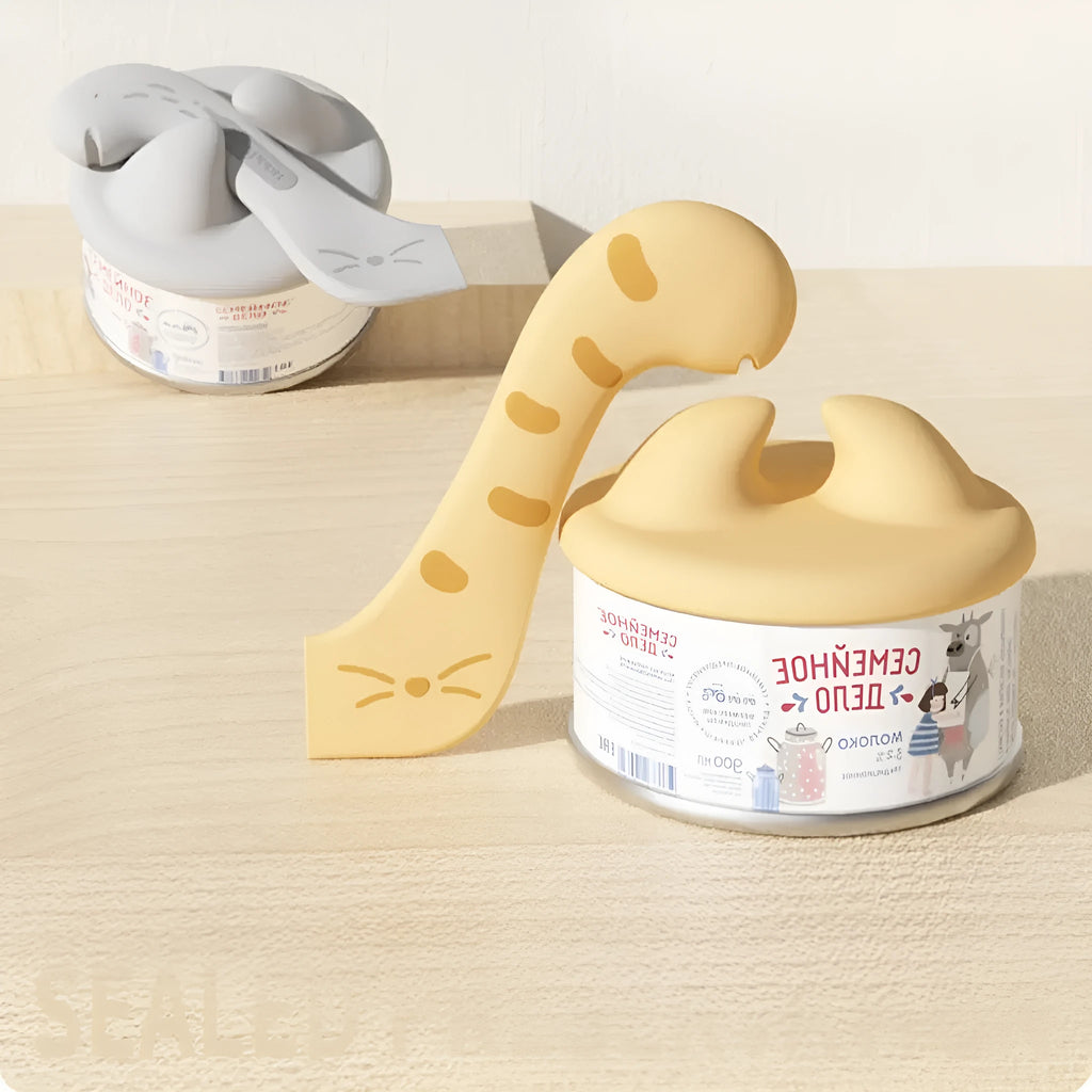 Multifunctional cat jar spoon in yellow colour with built-in can opener and feeding spoon made from ABS and silicone