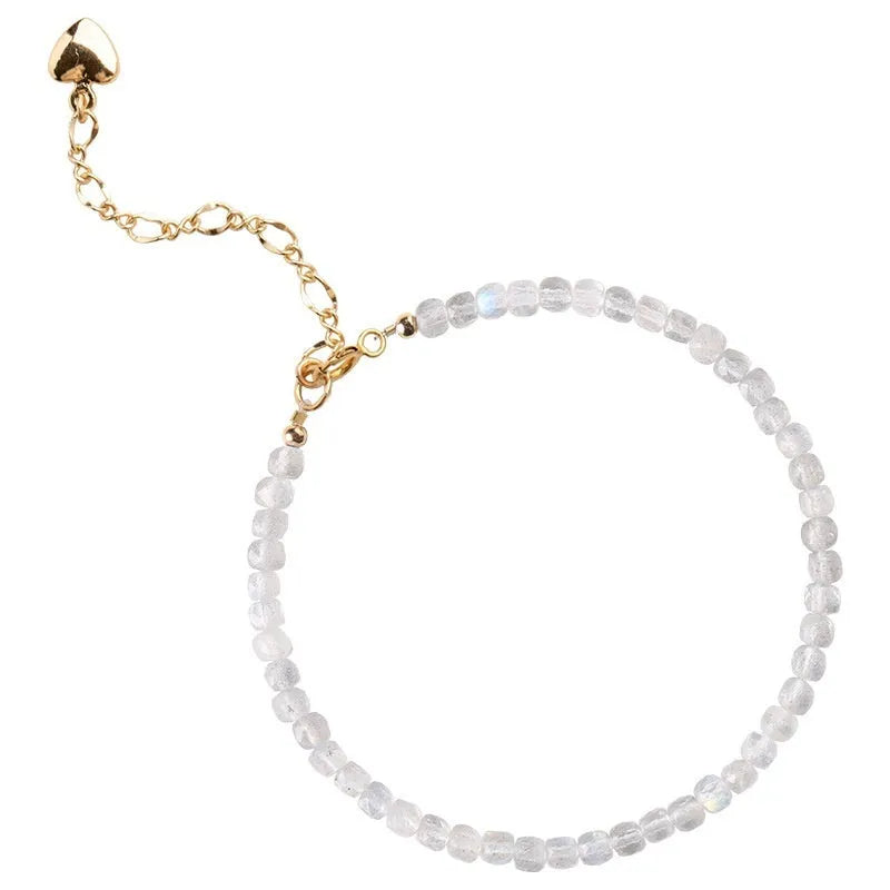 Natural gray moonstone diamond-shaped beads on a silver bracelet with clasp