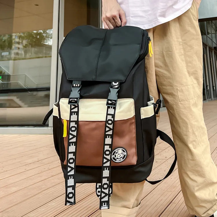 Oxford cloth student backpack showing three carrying methods in black, green and red colour options