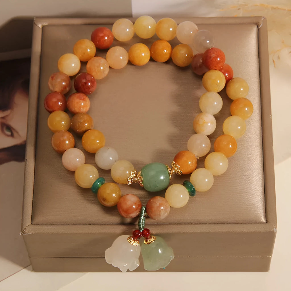 Natural Jinsi Jade multi-layer bracelet for women with orchid pendant colour option on plain background