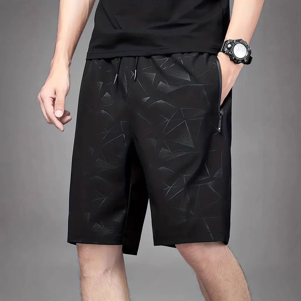 Men's loose fit printed sports shorts with elastic waistband in black, grey, or blue colours