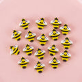 50 small colourful cartoon novelty erasers including fruit and animal shapes in a pearlescent film bag.
