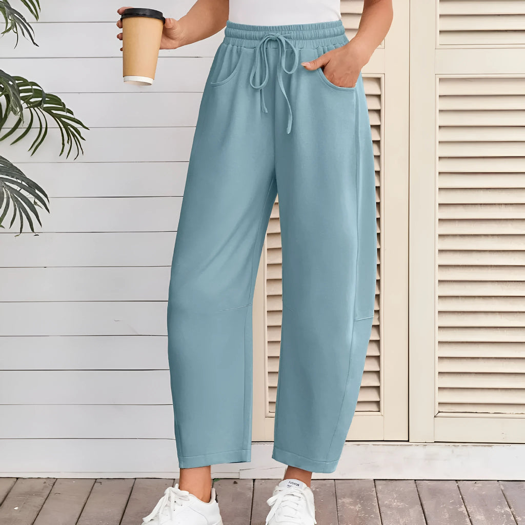 Loose cropped sweatpants with elastic drawstring waist and side pockets in apricot colour