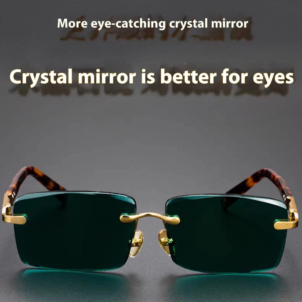 Frameless sunglasses with dark green tinted lenses lying on a hard protective case with a microfiber cloth.