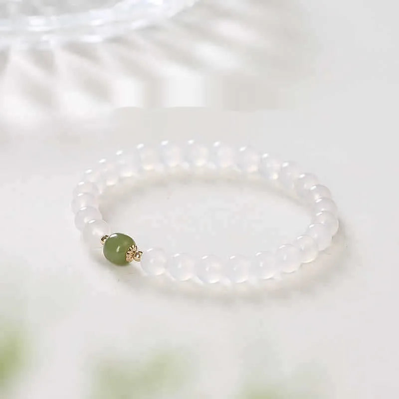 Natural white agate crystal bracelet with cinnabar inlay and lettering text on 8mm beads