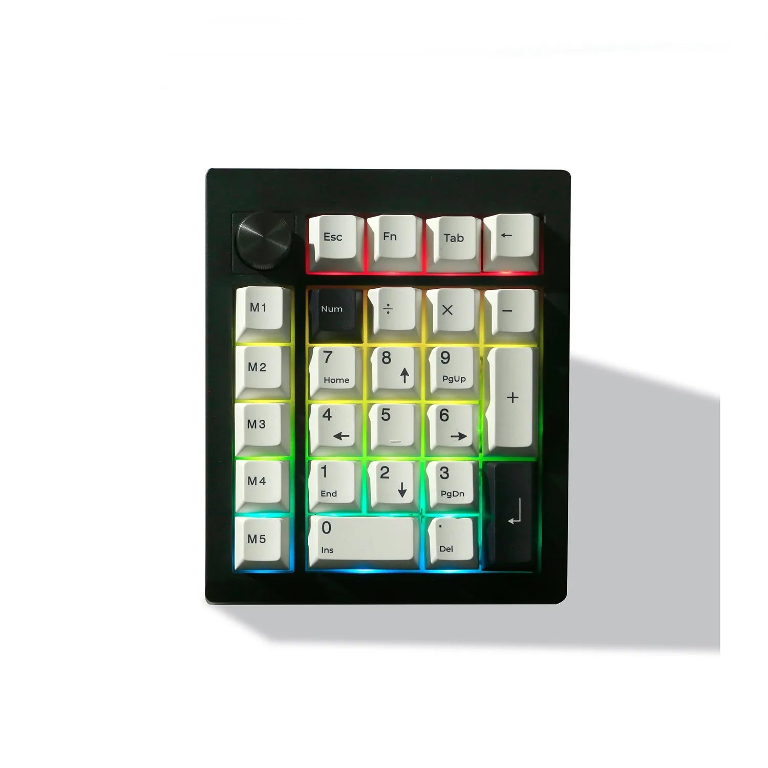 Black and white wireless Bluetooth mechanical numeric keyboard on a desk.