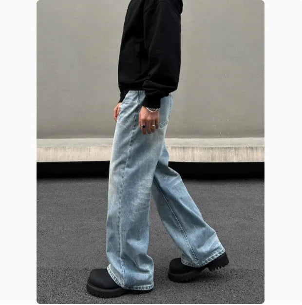 Men's retro whisker washed blue straight jeans with medium-high waist and visible stitching