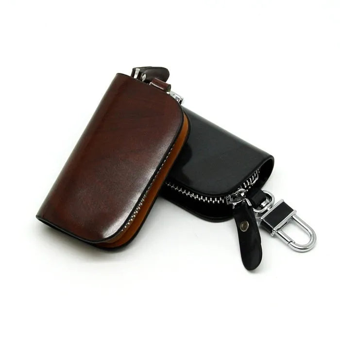 Genuine leather car key case with zipper closure and frosted finish in black or brown
