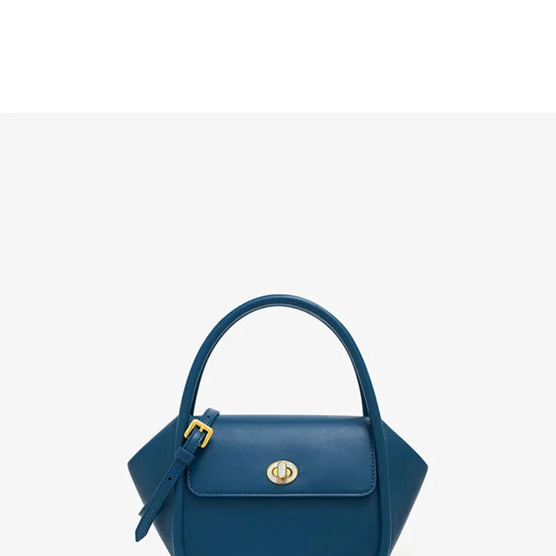 Women's wing-shaped cow leather tote handbag with a buckle closure in a choice of four colours.