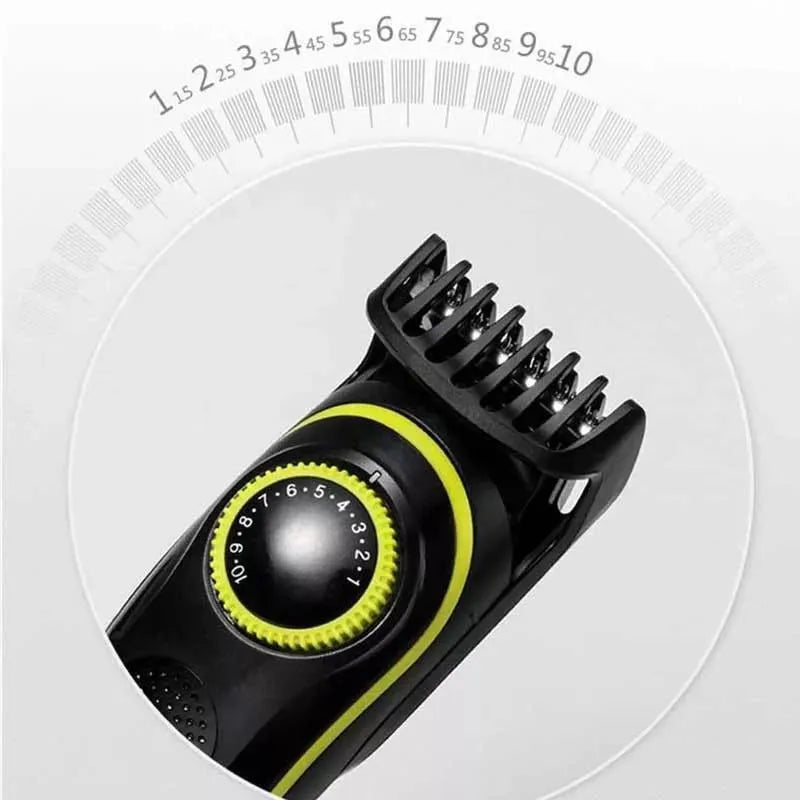 Black KM-696 rechargeable electric hair clipper with stainless steel blades on a white background.