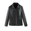Men's black PU leather casual jacket with zip pockets and a loose fit on a hanger.