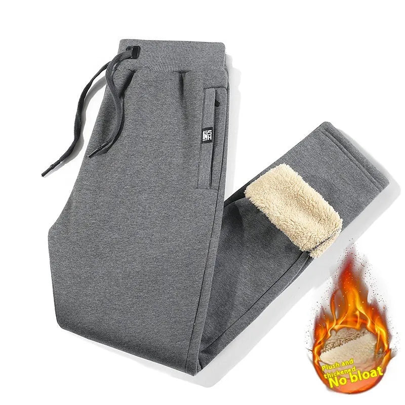 Men's grey fleece-lined cotton track pants with elastic waist and straight leg