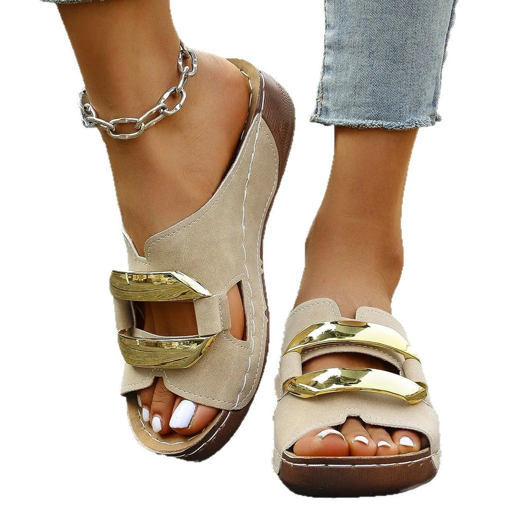 Roman style platform flip-flop sandals in a solid colour with a flat rubber sole