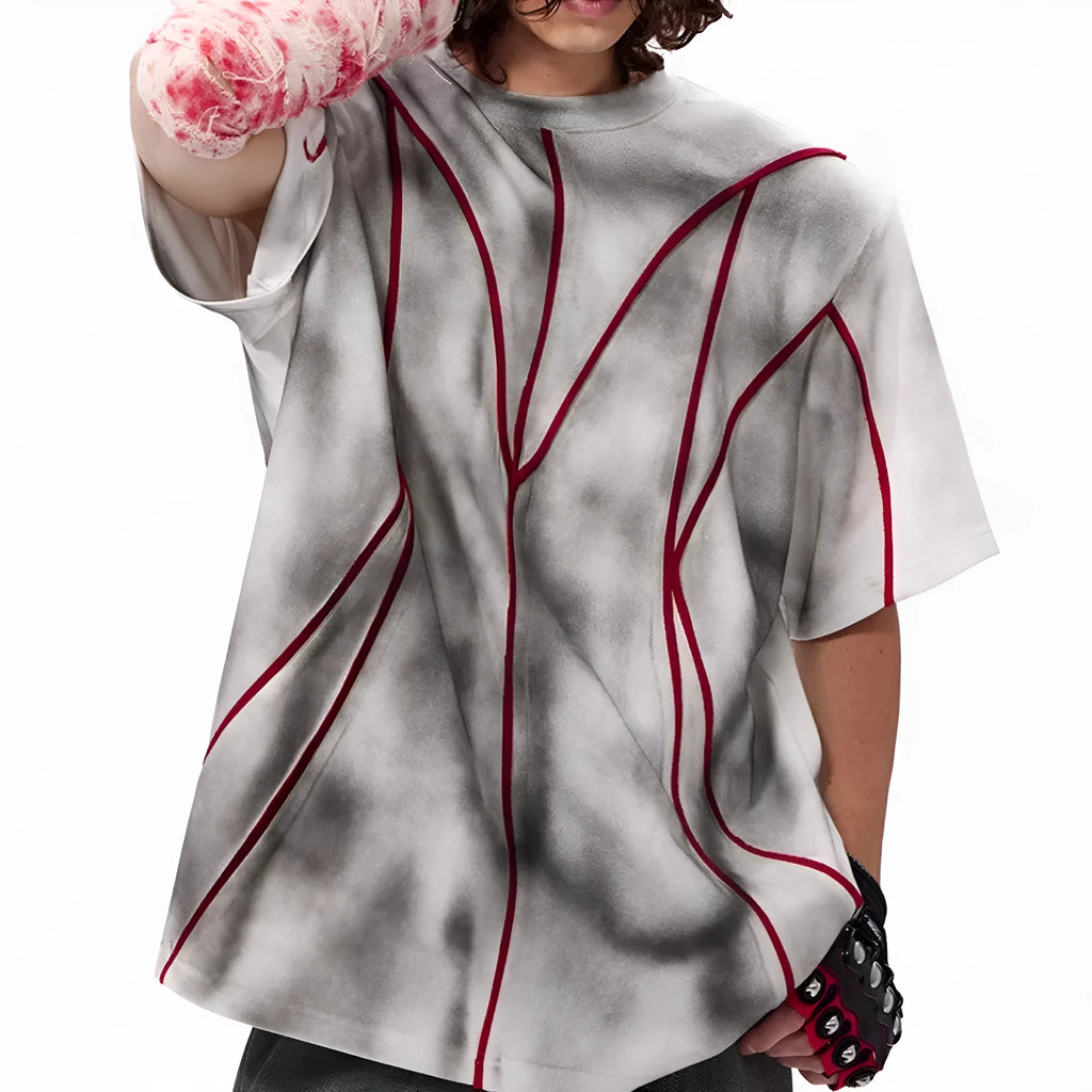 Padded shoulder short sleeve t-shirt with textured line patchwork design and round neck.