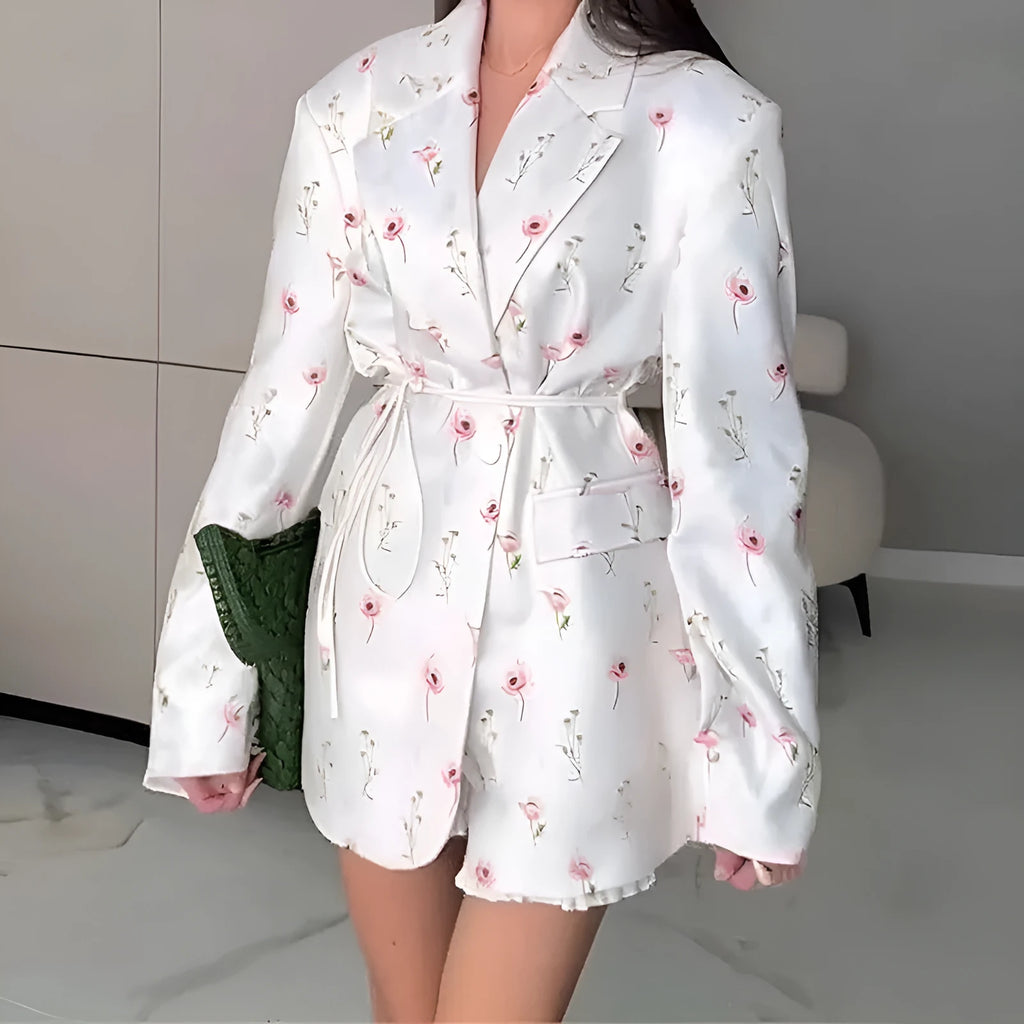 Women's apricot suit jacket with lace-up detail on the collar and a cinched waist.
