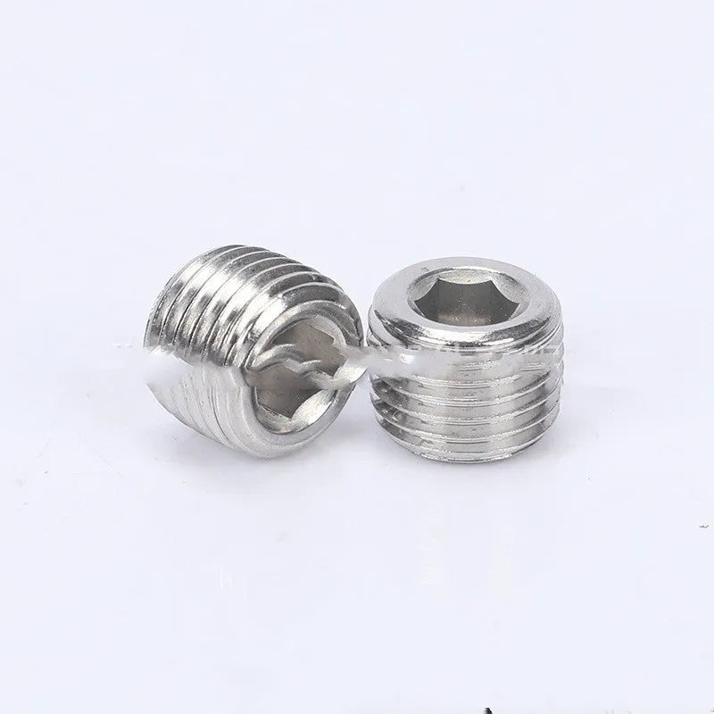 Stainless steel hexagonal head pipe plug for 3/8 inch threaded fittings.