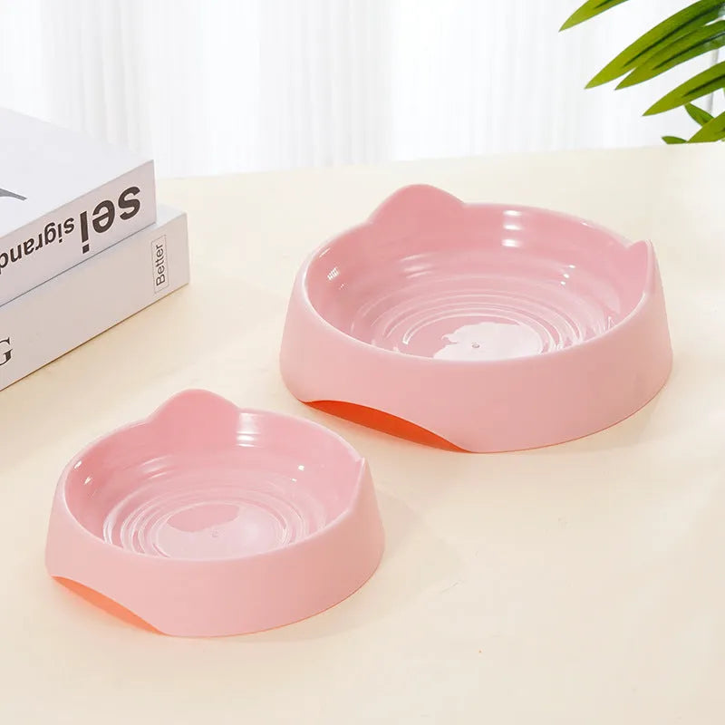 Blue ceramic dog slow feeder bowl with raised internal maze pattern for portion control