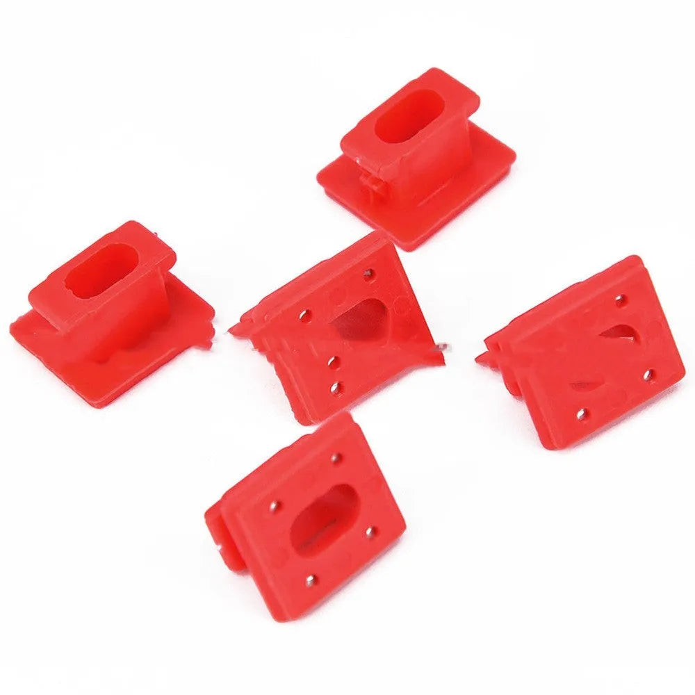 Ten black plastic BMW interior door panel trim clips or fasteners on a white background.