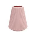 Colourful melamine plastic decorative flower vase measuring 16x20cm on desktop