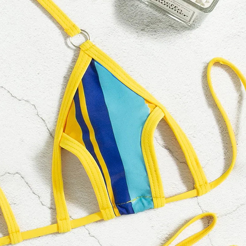 Yellow women's split swimsuit with neck-hanging style and hollow design