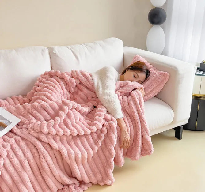 Soft Wind double-sided thickening bubble velvet blanket in a solid colour on a couch.