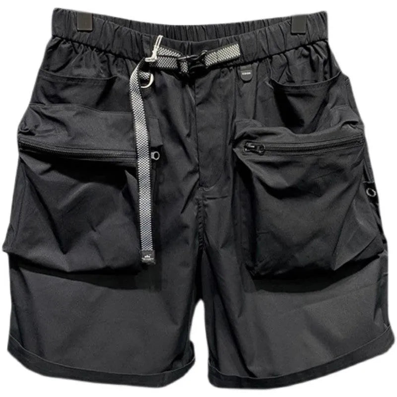 Man wearing large size loose fit black casual shorts with pockets.