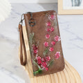 Embossed Chinese style handbag with floral pattern and hand-painted design in brown colour