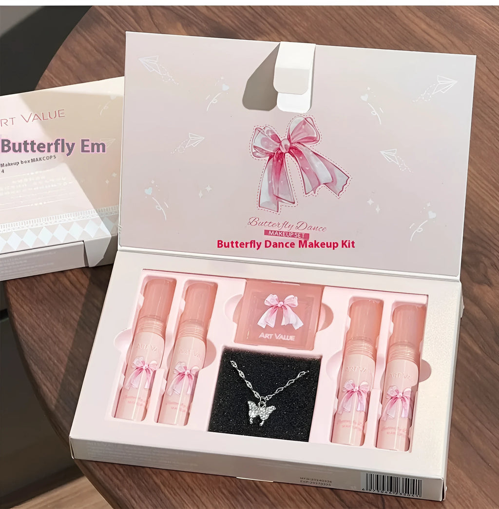 Butterfly Box makeup set showing lip mud containers, powder blusher compact, and necklace accessory with pink packaging