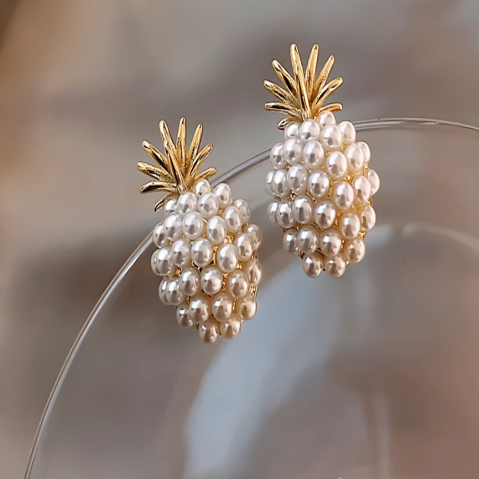 Korean style pineapple starfish pearl earrings in electroplated alloy with artificial gem inlays