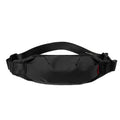 Black Oxford cloth crossbody waist pack showing multiple internal pockets and zipper closure