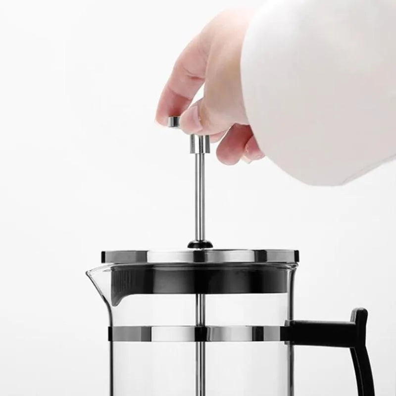 Glass manual pour-over coffee maker with stainless steel filter and separate glass flask, 350ml capacity.
