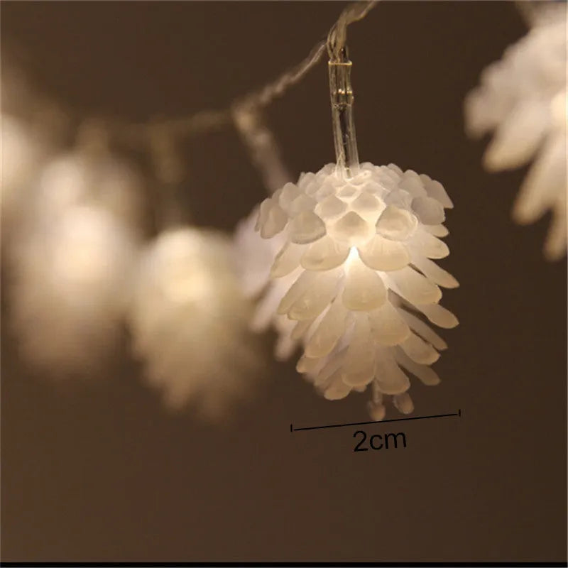 Warm white battery-powered LED pine cone light string for indoor and outdoor decoration