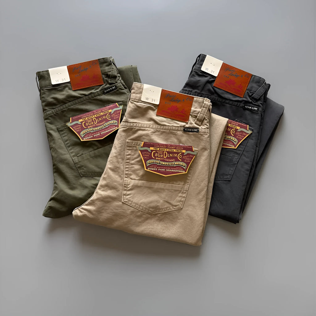 Men's straight leg casual cotton trousers in army green colour, showing mid waist and full length.