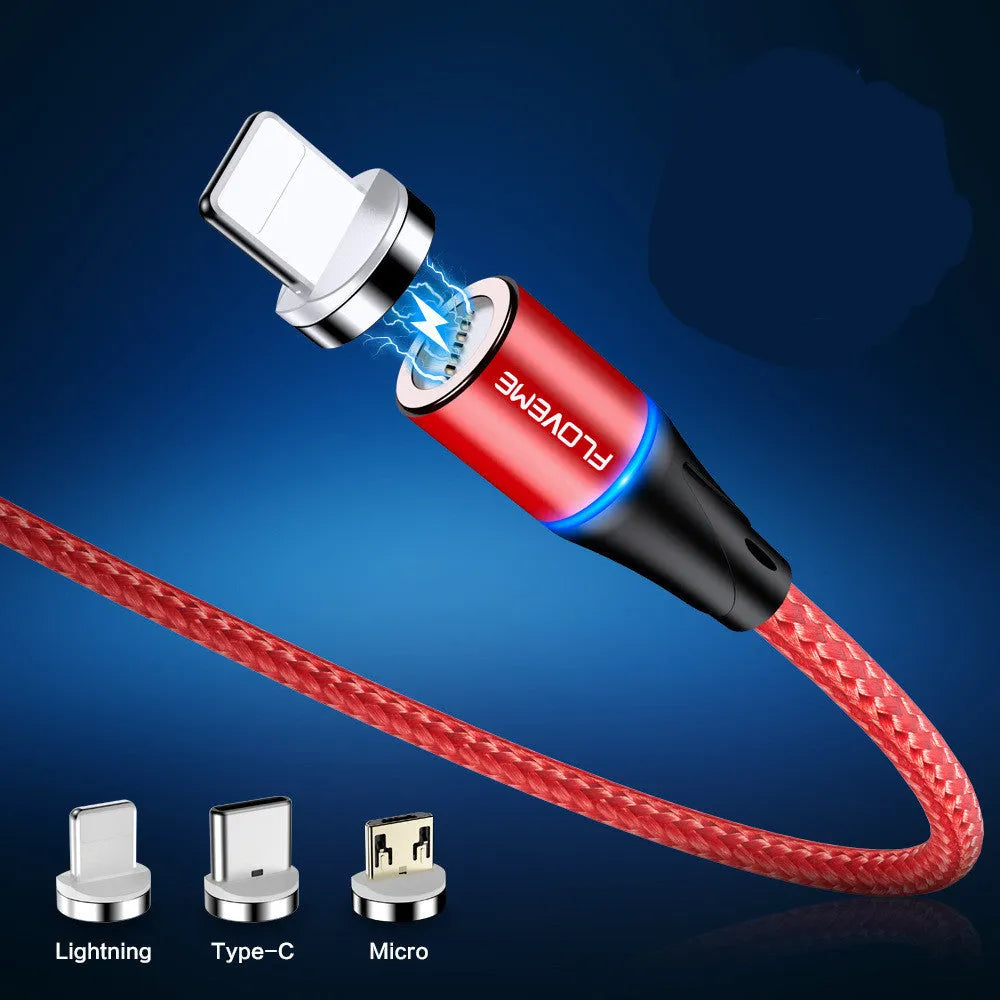 Black magnetic data cable with USB-C connector and side LED light, laid flat next to its aluminium foil packaging.