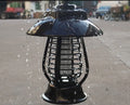 Black solar mosquito lamp with solar panel and LED lights for outdoor insect control