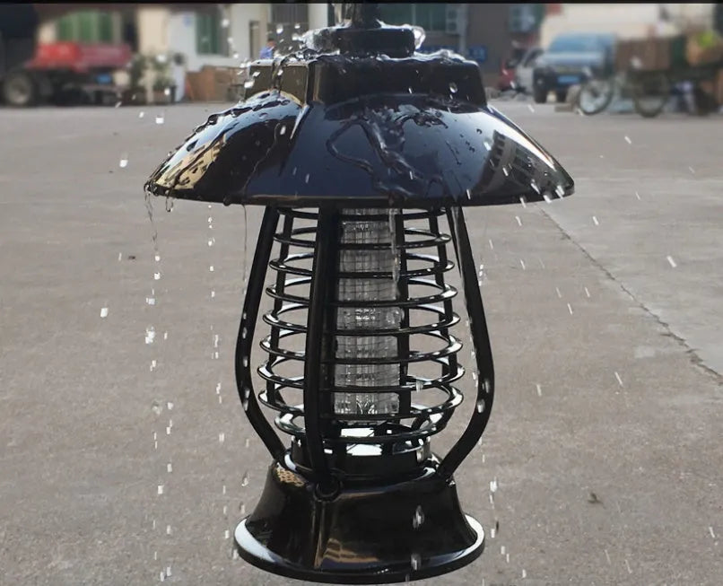 Black solar mosquito lamp with solar panel and LED lights for outdoor insect control