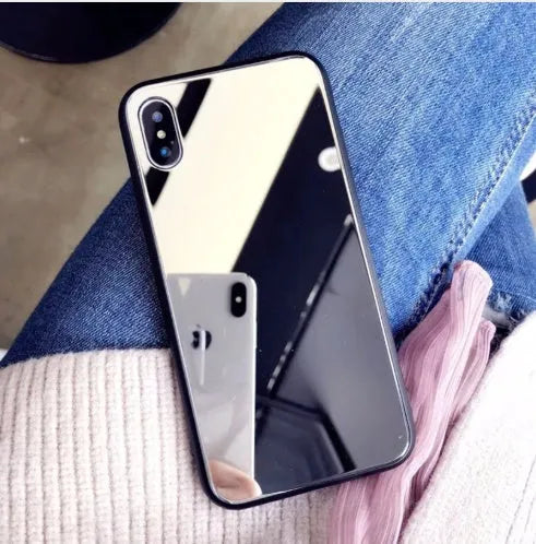 Black iPhone case with a square glass mirror on the back, compatible with iPhone X, 7 Plus, and 8 Plus.