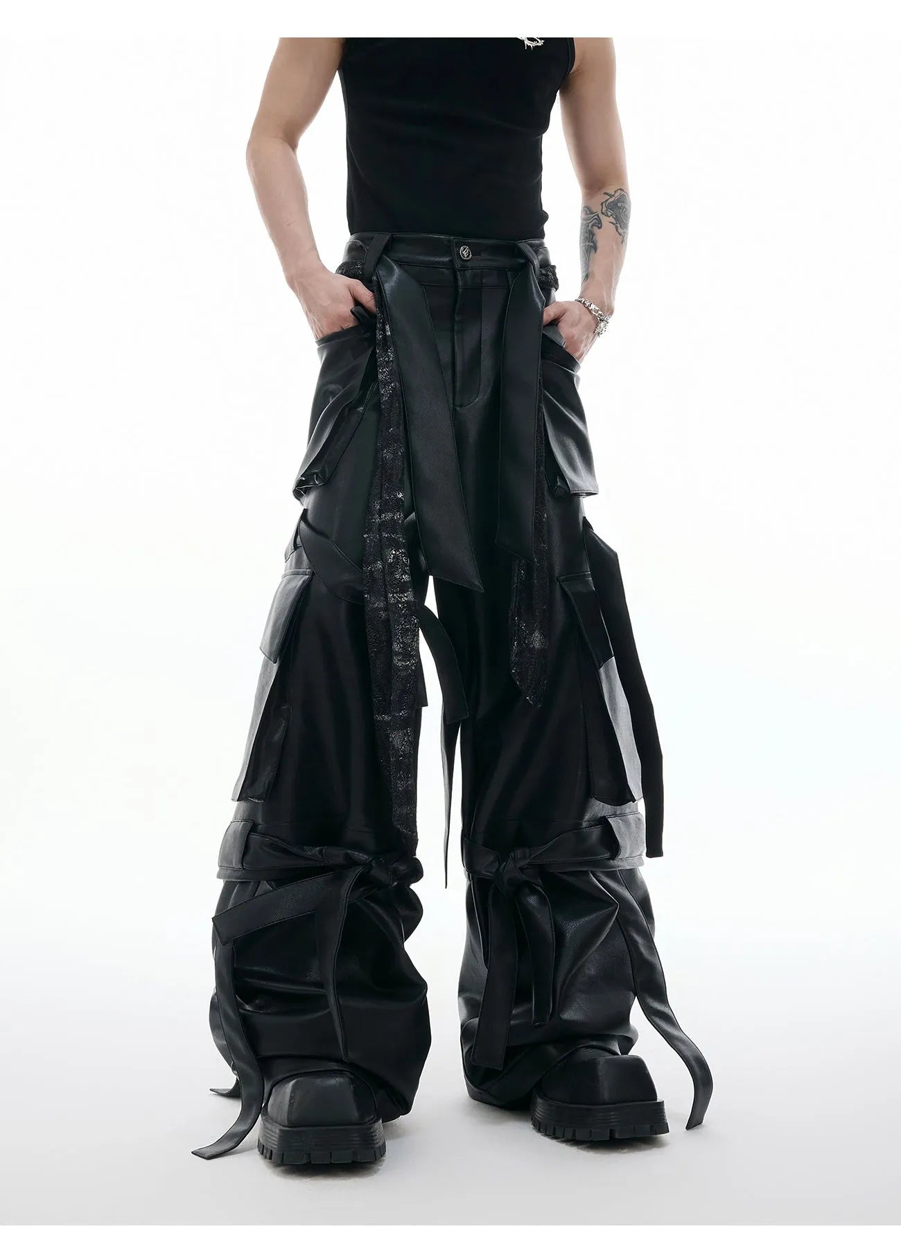 Black loose-fit retro trousers with quilted pattern and multiple stitched pockets.