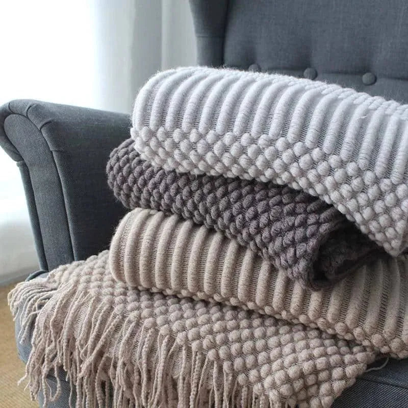 Small grey polyester nap blanket folded to show its 127x170cm size
