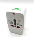 Compact white universal travel plug converter for global charging.