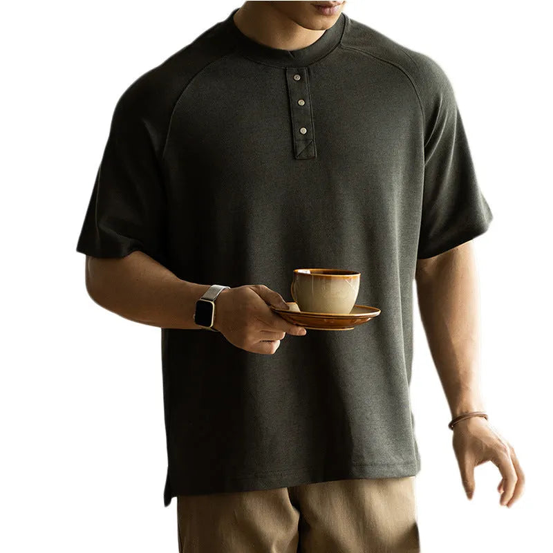 Men's smoky gray casual pullover top with raglan sleeves and a textured fabric.