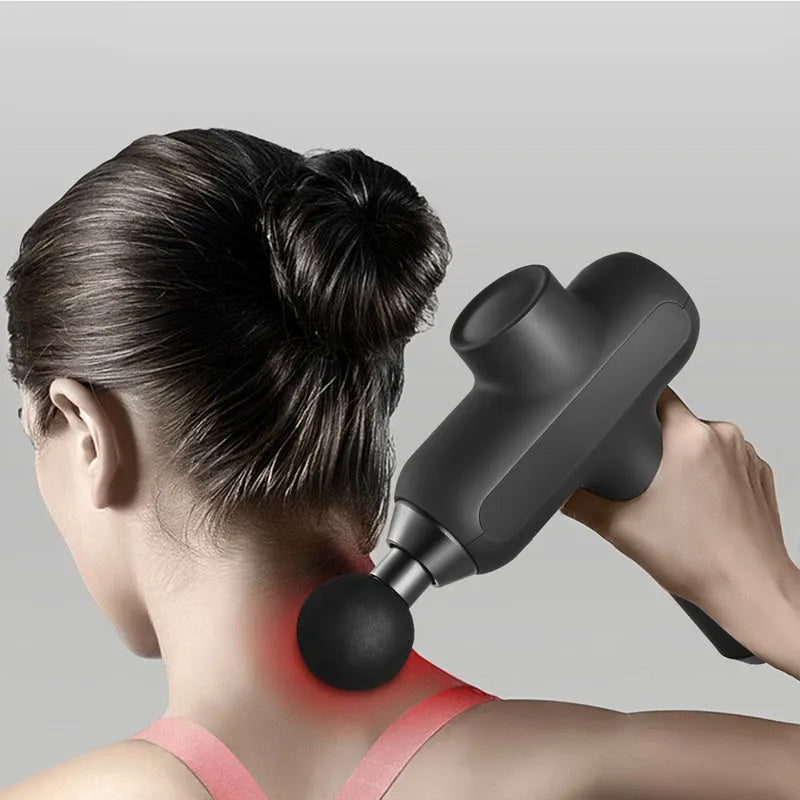 Black rechargeable muscle massager with six different massage heads showing five gear settings