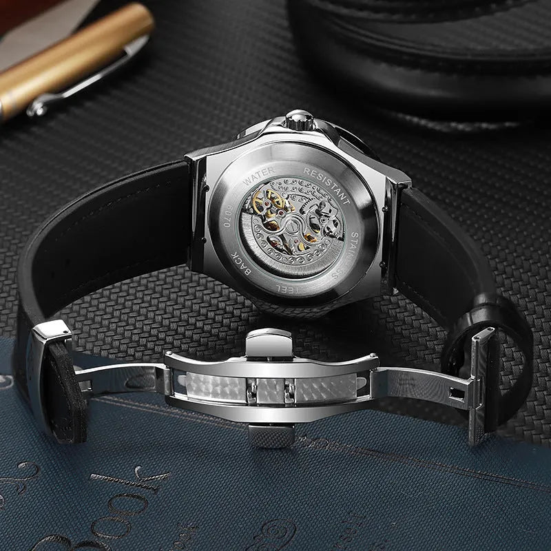 Men's automatic skeleton watch with diamond details on movement, white shell case, and black dial.