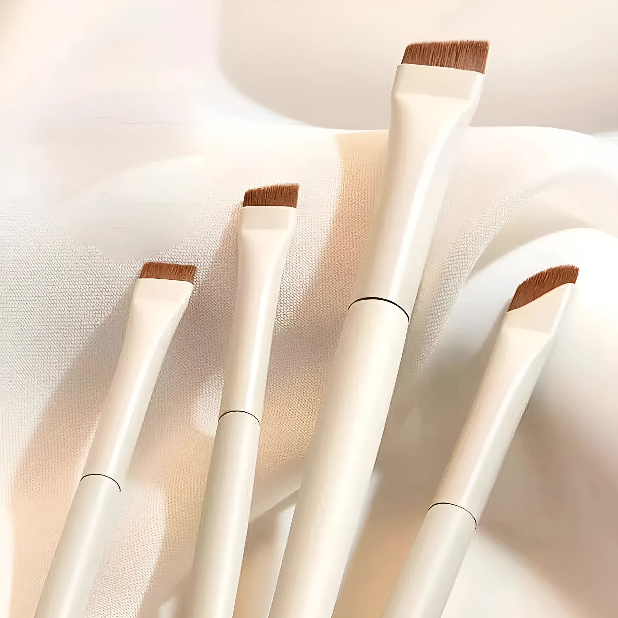 4 piece angled eyeliner and brow brush set in leather case