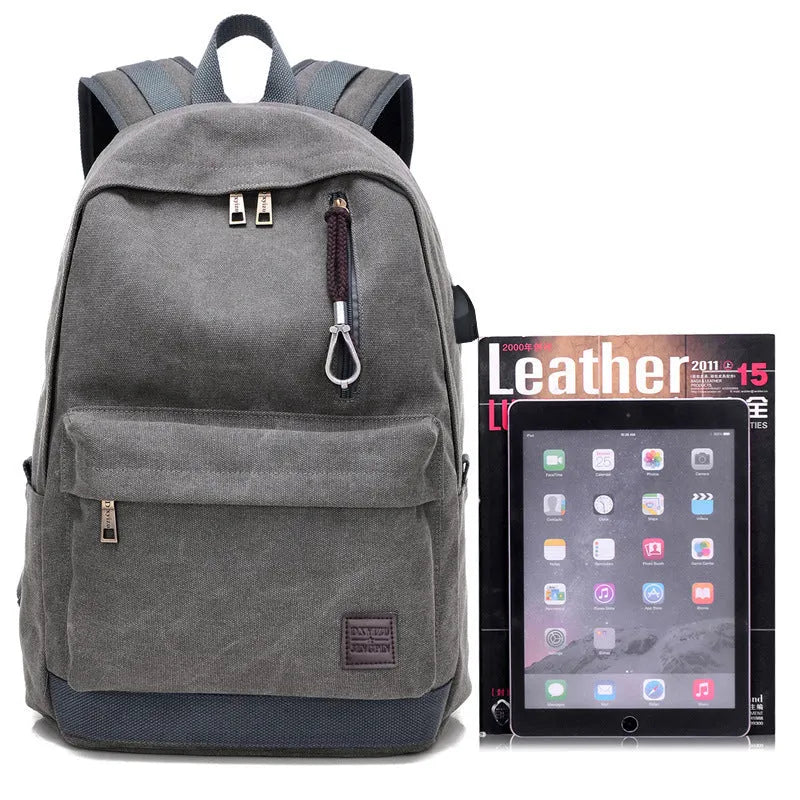 Canvas backpack with USB charging port in grey colour showing compartments