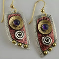 Gold geometric earrings with camouflage leopard print pattern and irregular stud design
