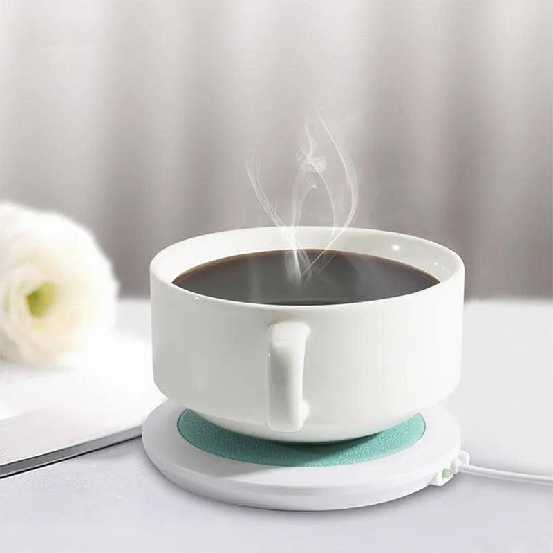 USB heating coaster in PU artificial leather on a desk with a coffee cup, available in black, blue, or orange